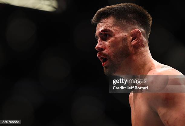 Dominick Cruz squares off with Cody Garbrandt in their UFC bantamweight championship bout during the UFC 207 event at T-Mobile Arena on December 30,...