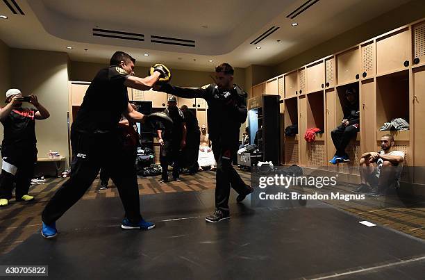 Dominick Cruz warms up backstage during the UFC 207 event at T-Mobile Arena on December 30, 2016 in Las Vegas, Nevada.