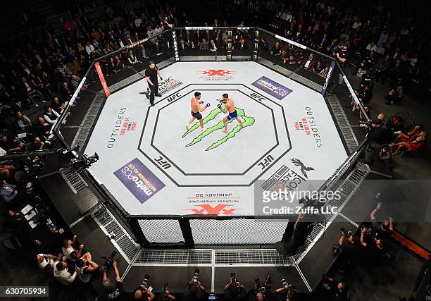 An overhead view of the Octagon as Dominick Cruz and Cody Garbrandt face off during the UFC 207 event at T-Mobile Arena on December 30, 2016 in Las...
