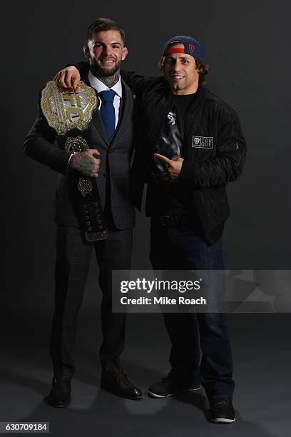 Bantamweight champion Cody Garbrandt poses with Urijah Faber backstage during the UFC 207 event at T-Mobile Arena on December 30, 2016 in Las Vegas,...