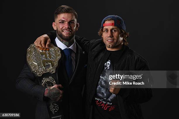 Bantamweight champion Cody Garbrandt poses with Urijah Faber backstage during the UFC 207 event at T-Mobile Arena on December 30, 2016 in Las Vegas,...