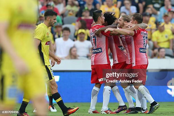 Tim Cahill of Melbourne City celebrates his goal with his team during the round 13 A-League match between the Central Coast Mariners and Melbourne...