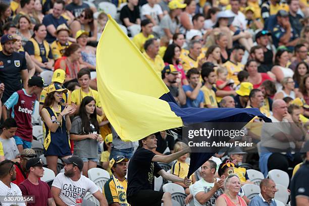 Mariners fans support their team during the round 13 A-League match between the Central Coast Mariners and Melbourne City at Central Coast Stadium on...