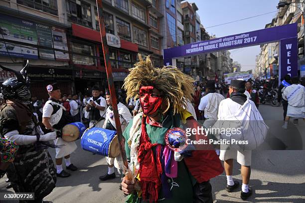 Nepalese Gurung community people dance in a tune of traditional instrument during the celebration of Tamu Lhosar or Losar at Kathmandu, Nepal on...