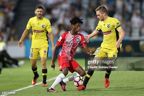 Bruce Kamau of Melbourne City controls the ball ahead of the Mariners defence during the round 13 A-League match between the Central Coast Mariners...