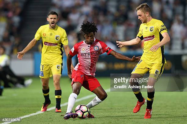 Bruce Kamau of Melbourne City controls the ball ahead of the Mariners defence during the round 13 A-League match between the Central Coast Mariners...