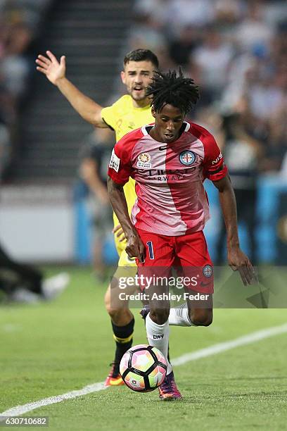 Bruce Kamau of Melbourne City controls the ball ahead of the Mariners defence during the round 13 A-League match between the Central Coast Mariners...