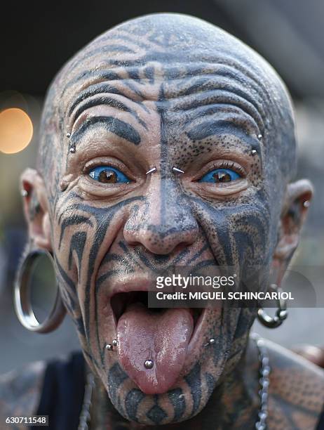 Man with tattoos and piercings is seen before the start of the 92nd Sao Silvestre international 15 km race in Sao Paulo, Brazil, on 31 December 2016....