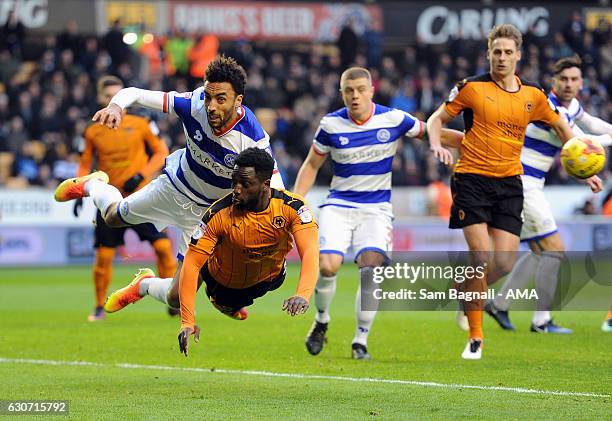 James Perch of Queens Park Rangers and Nouha Dicko of Wolverhampton Wanderers during the Sky Bet Championship match between Wolverhampton Wanderers...