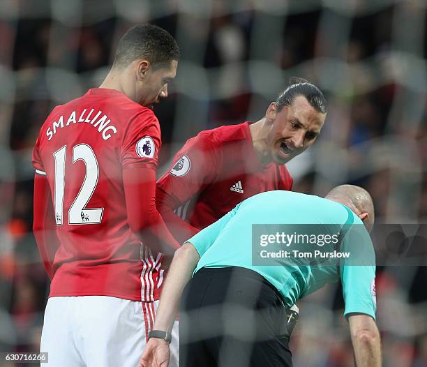 Zlatan Ibrahimovic of Manchester United argues with referee Lee Mason after having a goal disallowed for high feet during the Premier League match...