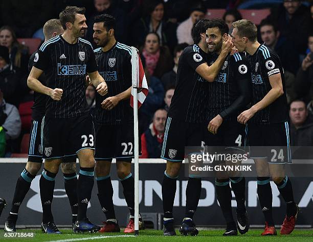 West Bromwich Albion's English-born Welsh striker Hal Robson-Kanu celebrates scoring his team's second goal during the English Premier League...