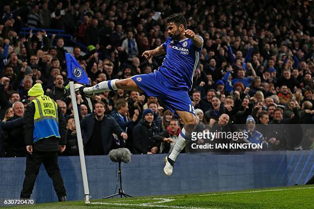 Chelsea's Brazilian-born Spanish striker Diego Costa celebrates after scoring their fourth goal during the English Premier League football match...