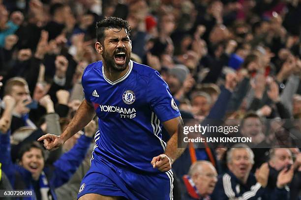 Chelsea's Brazilian-born Spanish striker Diego Costa celebrates after scoring their fourth goal during the English Premier League football match...