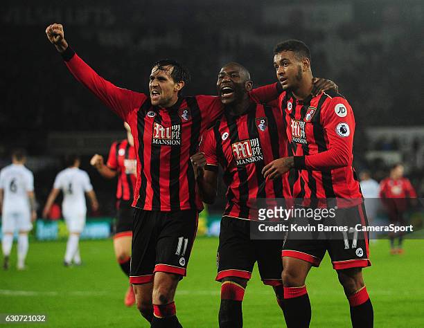 Bournemouth's Joshua King celebrates scoring his sides third goal with team-mates Benik Afobe and Charlie Daniels during the Premier League match...