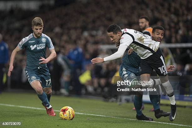 Derby, ENGLANDTom Ince of Derby County and Nathan Byrne of Wigan Athletic in action during the Sky Bet Championship match between Derby County and...