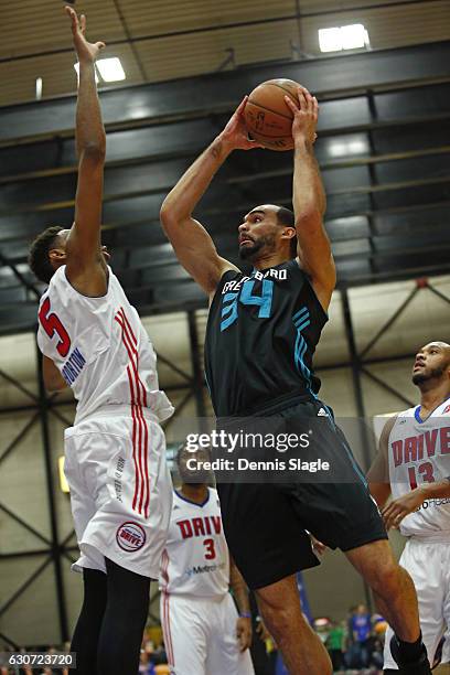 Perry Ellis of the Greensboro Swarm drives to the basket against the Grand Rapids Drive at The DeltaPlex Arena on December 30, 2016 in Grand Rapids,...