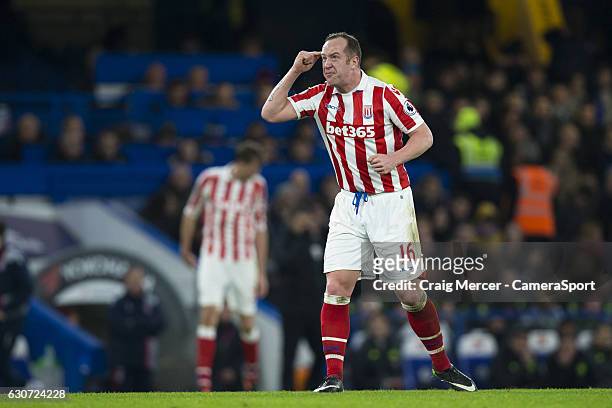 Stoke City's Charlie Adam reacts during the Premier League match between Chelsea and Stoke City at Stamford Bridge on December 31, 2016 in London,...