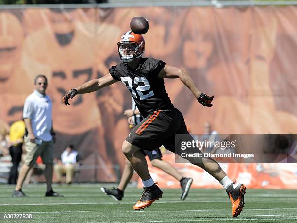 Tight end Gary Barnidge of the Cleveland Browns drops a pass during a training camp practice on July 30, 2015 at the Cleveland Browns training...