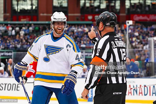 Chris Pronger of the St. Louis Blues Alumni Team is called out by the referee during the Alumni Game against the Chicago Blackhawks as part of the...
