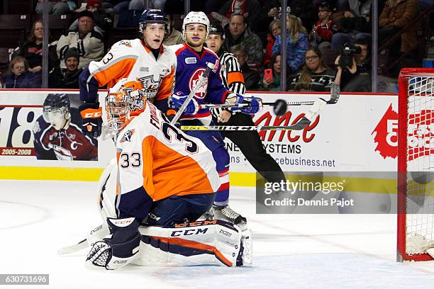 Goaltender Garrett Forrest of the Flint Firebirds watches the puck in a game against the Windsor Spitfires on December 31, 2016 at the WFCU Centre in...