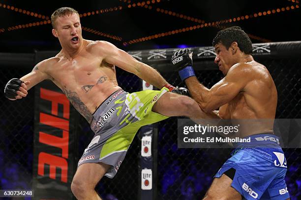 Justin Gaethje throws a kick to the body of challenger Luis Firmino during their World Series of Fighting lightweight championship fight at The...