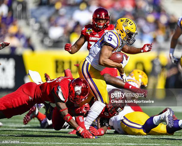 Tigers running back Derrius Guice during the first half of the Citrus Bowl game between the Louisville Cardinals and the LSU Tigers on December 31 at...