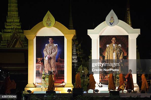 Big picture Thailand's new King Maha Vajiralongkorn Bodindradebayavarangkun and late King Bhumibol Adulyadej during the New Year's Eve 2016 countdown...