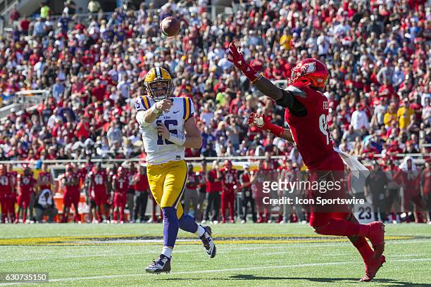 Tigers quarterback Danny Etling throws a touchdown pass in the second quarter during the Citrus Bowl game between the Louisville Cardinals and the...