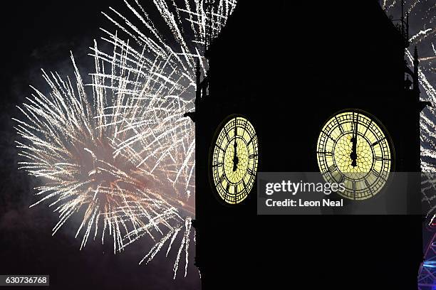 Fireworks light up the London skyline and Big Ben just after midnight on January 1, 2017 in London, England. Thousands of people lined the banks of...