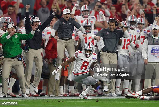 Gareon Conley of the Ohio State Buckeyes intercepts a pass intended for Mike Williams of the Clemson Tigers during the first half of the 2016...