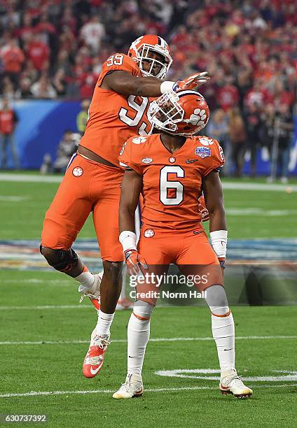 Clelin Ferrell of the Clemson Tigers and Dorian O'Daniel of the Clemson Tigers react during the first half of the 2016 PlayStation Fiesta Bowl...