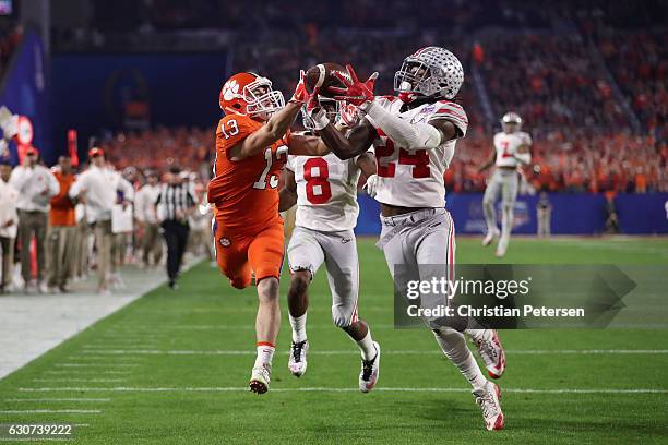 Malik Hooker of the Ohio State Buckeyes intercepts a pass intended for Hunter Renfrow of the Clemson Tigers during the first half of the 2016...