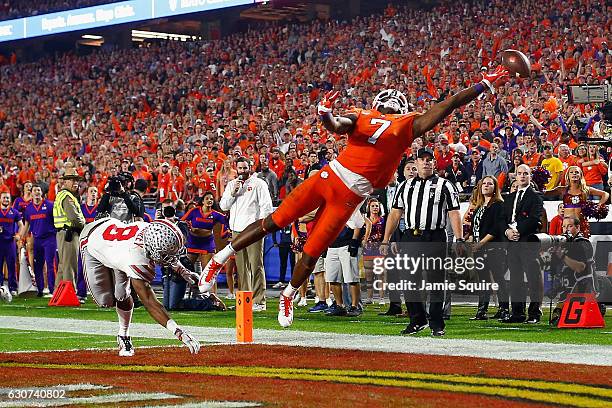Mike Williams of the Clemson Tigers can't pull in a pass while being defended by Gareon Conley of the Ohio State Buckeyes during the first half of...