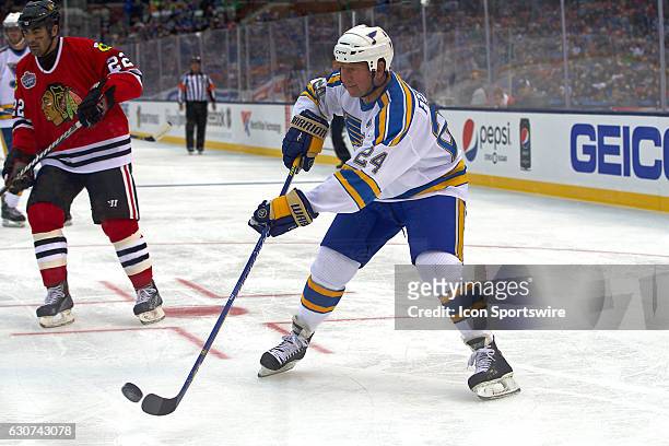 St. Louis Blues Forward Bernie Federko skates with the puck during a NHL Winter Classic Alumni hockey game between the St. Louis Blues and the...