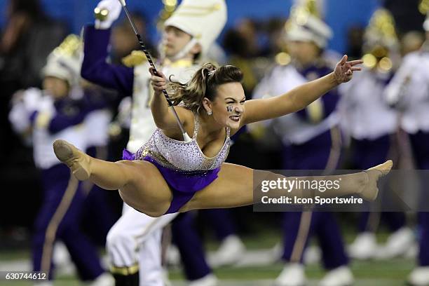 Washington Huskies majorette at the College Football Playoff Semifinal at the Chick-fil-A Peach Bowl between the Washington Huskies and the Alabama...