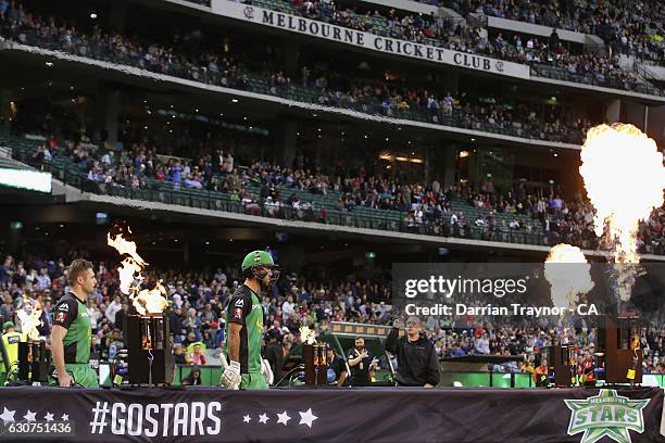 Luke Wright and Glenn Maxwell of the Melbourne Stars walk out to bat during the Big Bash League match between the Melbourne Stars and Melbourne...