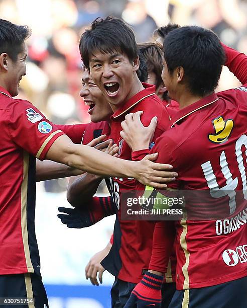 Kashima Antlers defender Shuto Yamamoto shouts in celebratation to his goal with teammates during the 96th Emperor's Cup football tournament final...