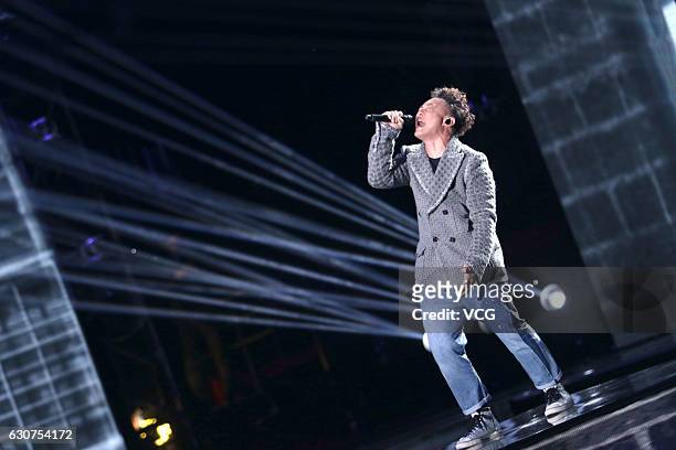 Singer Eason Chan performs onstage during the new year countdown part held by Shanghai Dragon TV on December 31, 2016 in Shanghai, China.