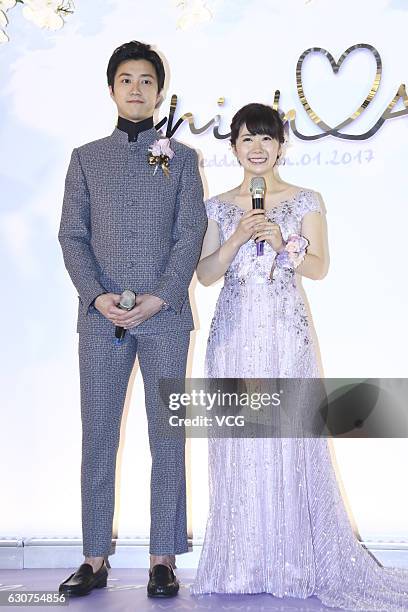 Taiwanese table tennis player Chiang Hung-chieh meets media with his wife Japanese table tennis player Ai Fukuhara during their wedding ceremony on...