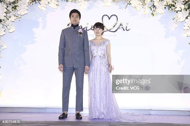 Taiwanese table tennis player Chiang Hung-chieh meets media with his wife Japanese table tennis player Ai Fukuhara during their wedding ceremony on...