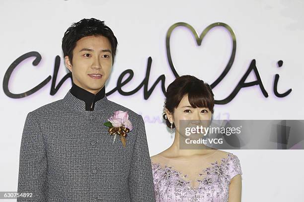 Taiwanese table tennis player Chiang Hung-chieh meets media with his wife Japanese table tennis player Ai Fukuhara during their wedding ceremony on...