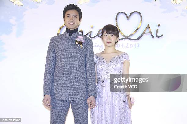 Taiwanese table tennis player Chiang Hung-chieh meets media with his wife Japanese table tennis player Ai Fukuhara during their wedding ceremony on...