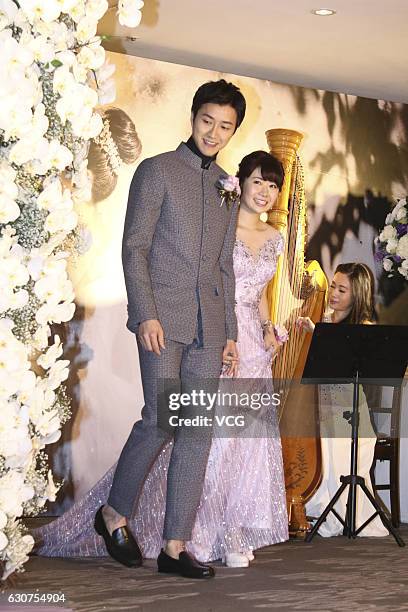 Taiwanese table tennis player Chiang Hung-chieh meets media with his wife Japanese table tennis player Ai Fukuhara during their wedding ceremony on...