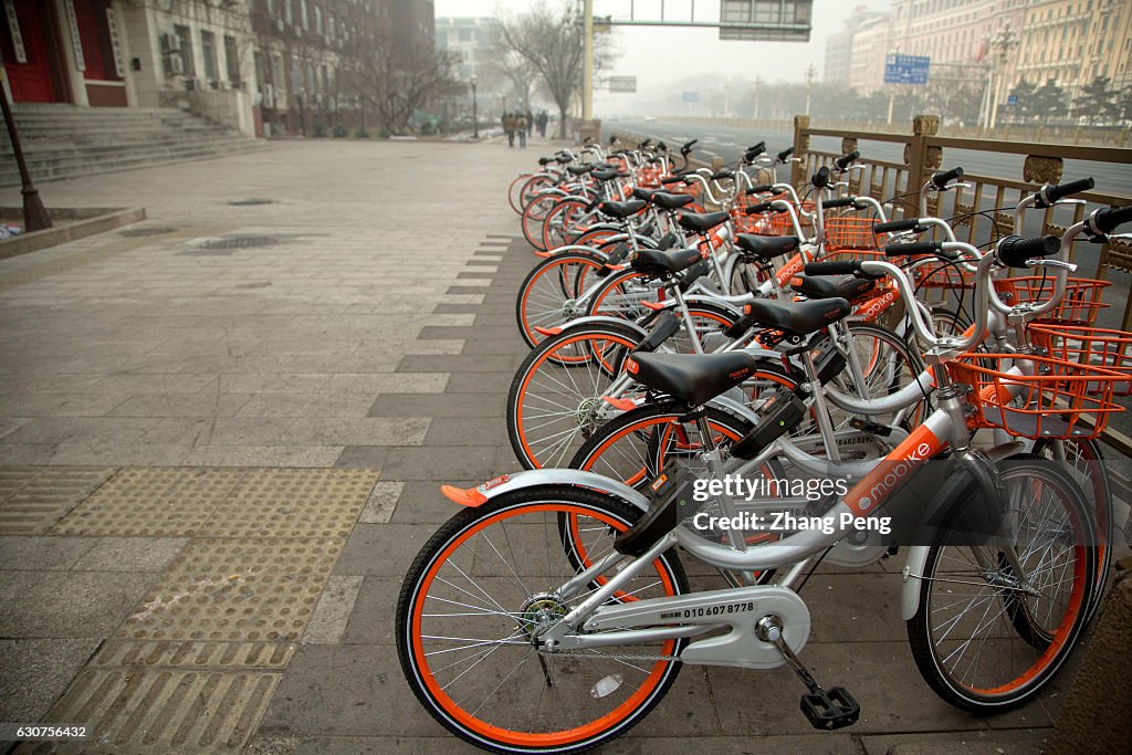 Mobikes bikes lined up on the streets.  Mobike is one of...