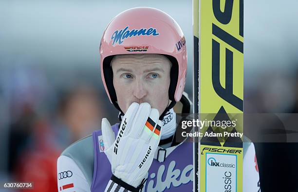 Severin Freund of Germany gestures after his final competition jump on Day 2 of the 65th Four Hills Tournament ski jumping event on January 1, 2017...