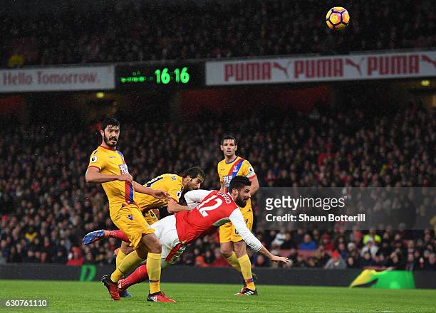 Olivier Giroud of Arsenal scores the opening goal during the Premier League match between Arsenal and Crystal Palace at the Emirates Stadium on...