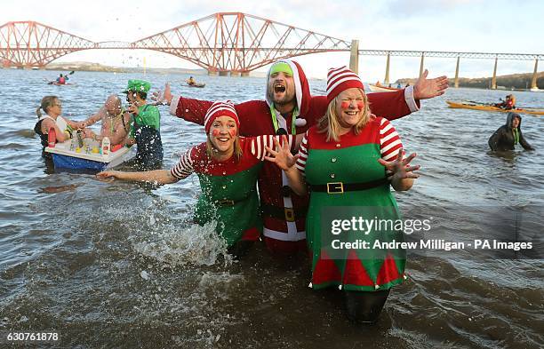 Swimmers take part in the Loony Dook New Year's Day dip in the Firth of Forth at South Queensferry, as part of Edinburgh's Hogmanay celebrations.