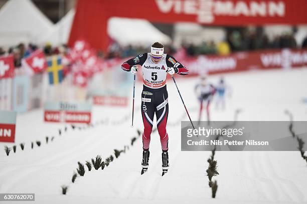 Ingvild Flugstad Oestberg of Norway competes during the women's 5 km C mass start race on January 1, 2017 in Val Mustair, Switzerland.