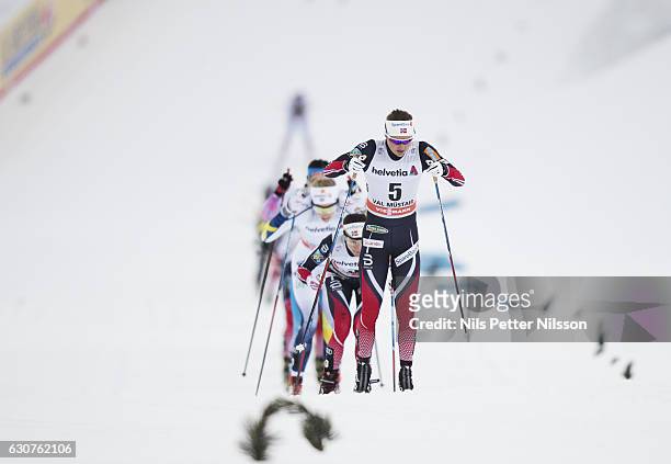 Ingvild Flugstad Oestberg of Norway competes during the women's 5 km C mass start race on January 1, 2017 in Val Mustair, Switzerland.
