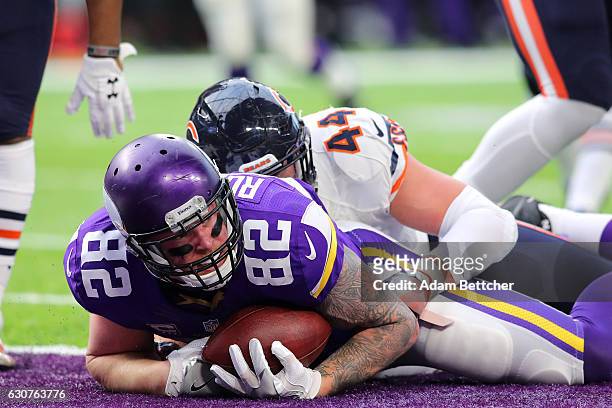 Kyle Rudolph of the Minnesota Vikings in the end zone with the ball on a 22 yard touchdown play in the second quarter of the game agains the Chicago...